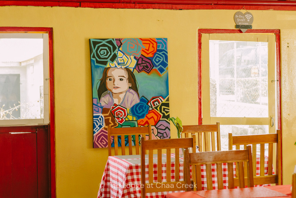 artwork inside cenaidas belizean restaurant in san ignacio belize