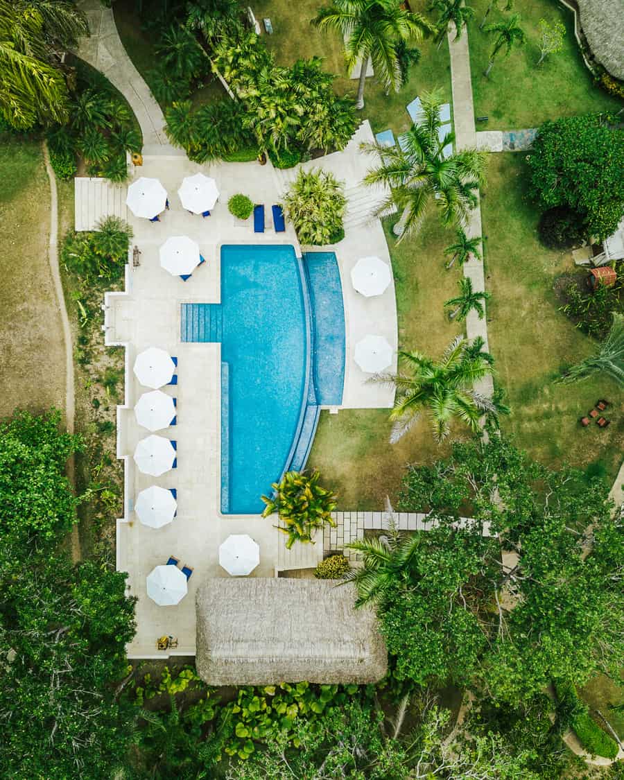 chaa creek swimming pool aerial shot of grounds