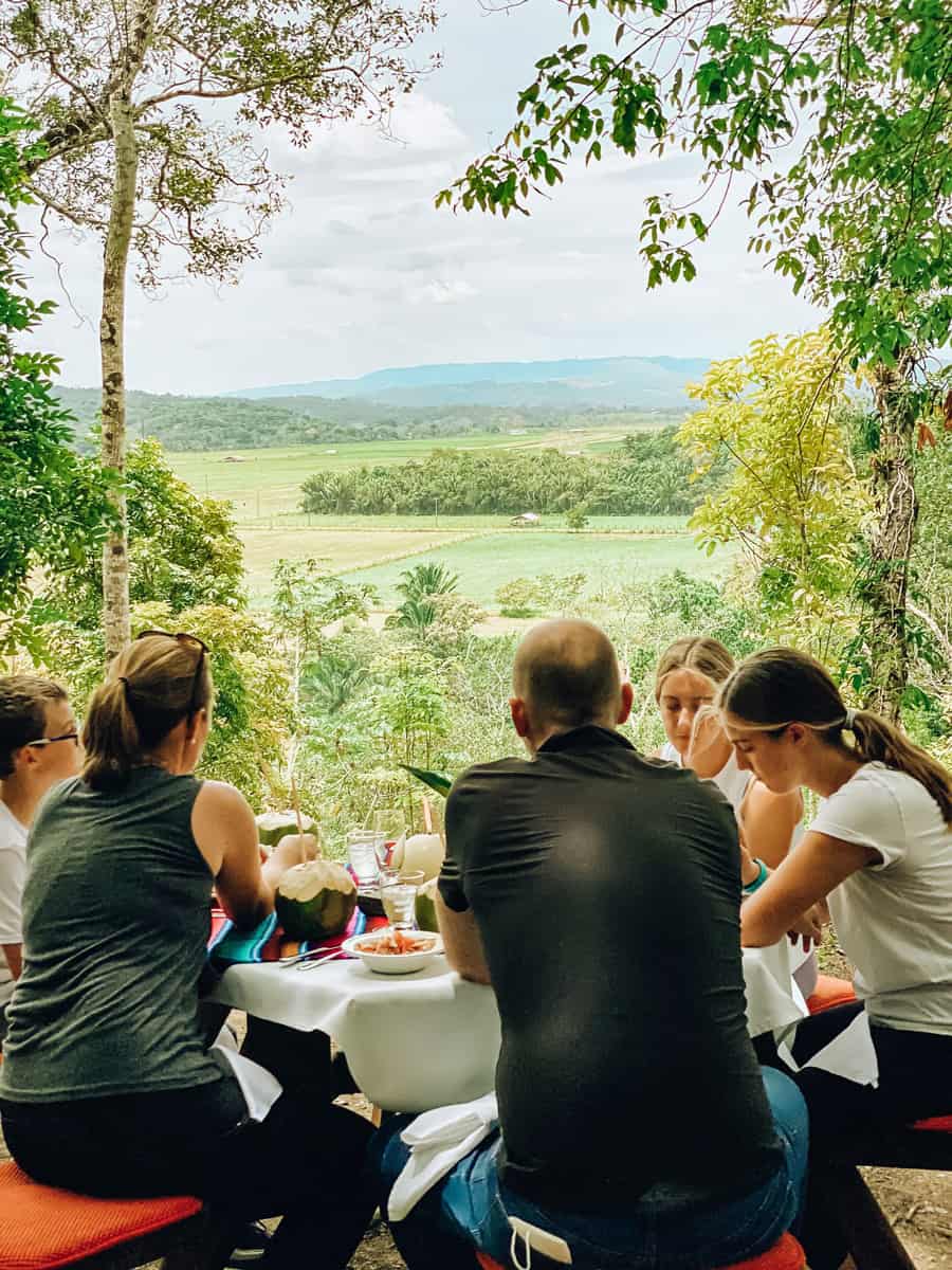 Belize with family dining at Chaa Creek lookout