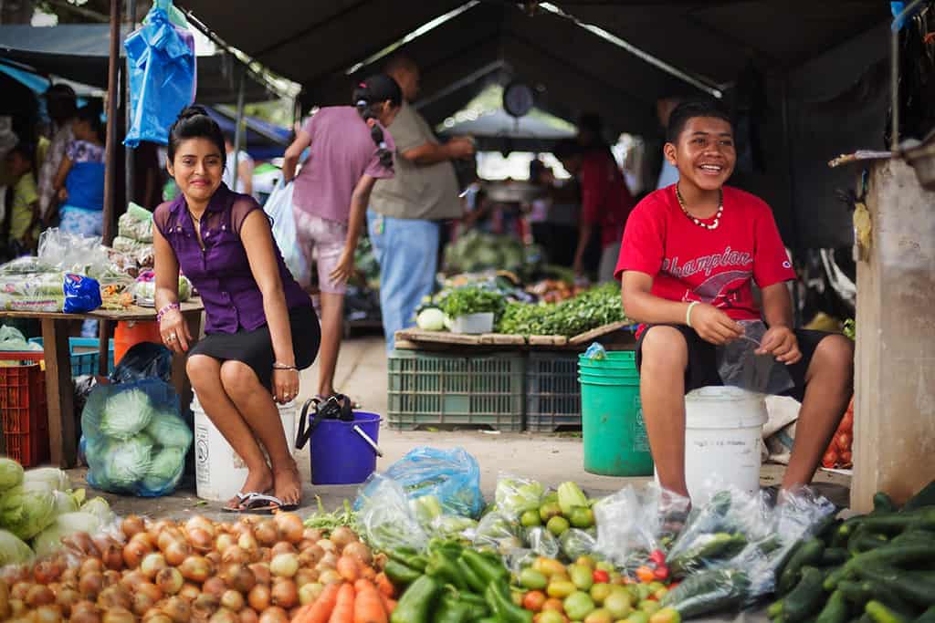 San Ignacio farmers market young people smiling