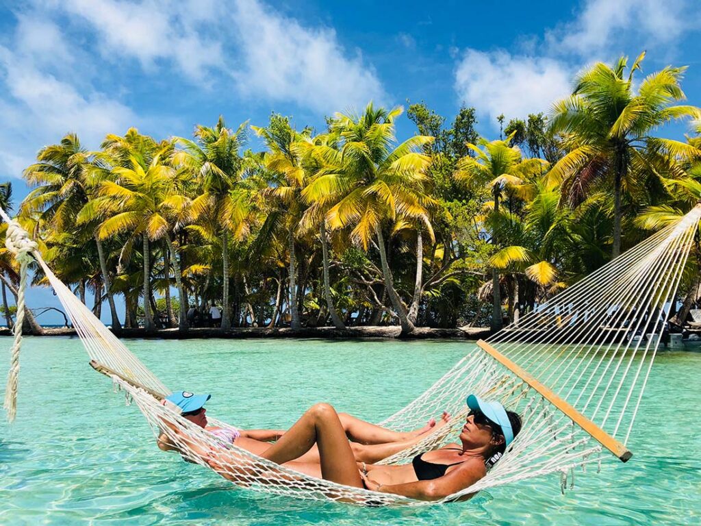 Enjoy a hammock on a private island with Belize Sailing Vacations